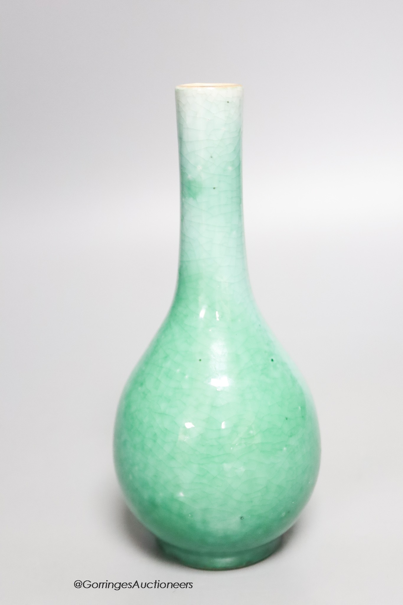 A Chinese green crackle glazed bottle vase, height 19cm